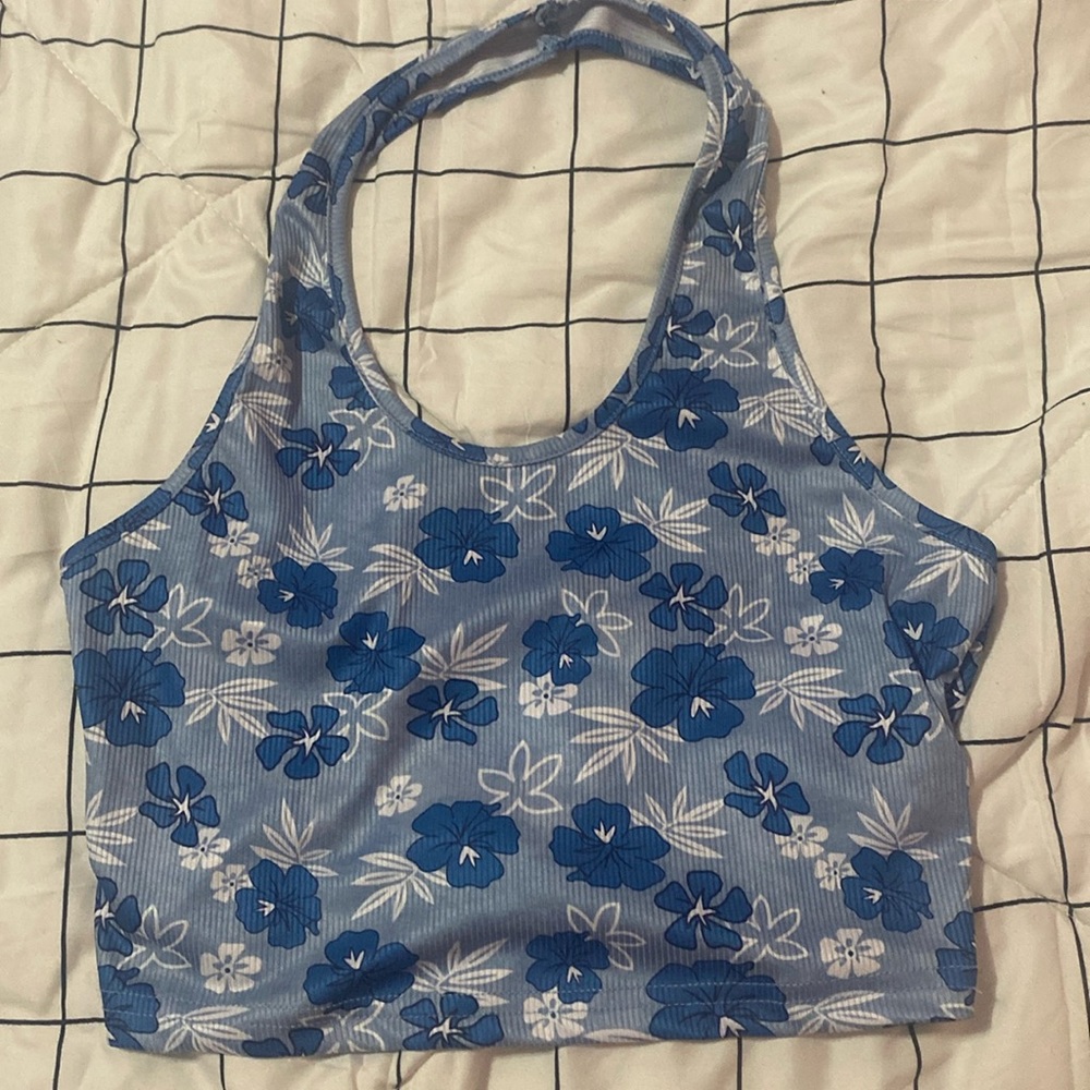 This crop top is from SHEIN it is a small but it’s a little big
